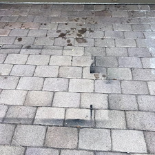 Pressure-Washing-Driveway-Oil-Stain-and-paint-removal-from-paver-driveway-located-at-Greenacres-FL-33415 2